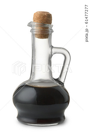 Side view of soy sauce in glass bottle 61477277