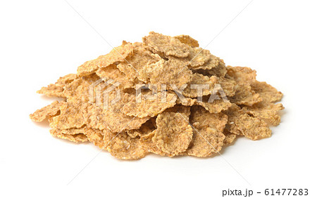 Pile of organic bran flakes 61477283
