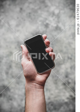 Smart cell phone in hand Smart cell phone in hand 61479630
