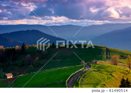 mountainous rural landscape in evening light 61490514