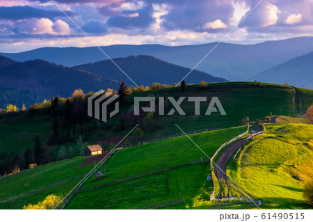 mountainous rural landscape in evening light mountainous rural landscape in evening light 61490515