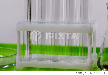 A desk at a chemistry lab or clinic. 61490691