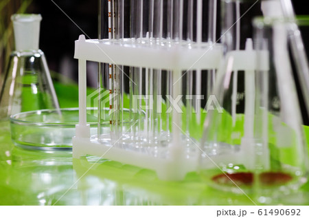 A desk at a chemistry lab or clinic. 61490692