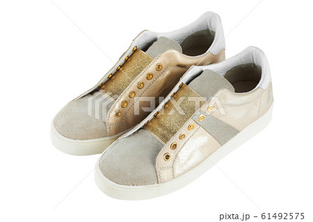 female sneakers on a white background female sneakers on a white background 61492575
