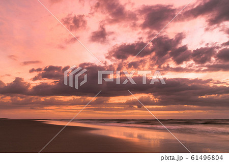 Beauty Evening Sunrise at a beach in Holland 61496804