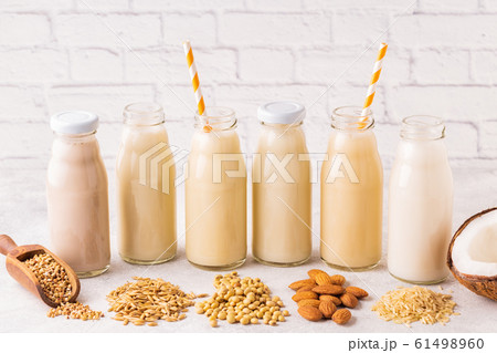 A bottles of alternative  milk and ingredient 61498960