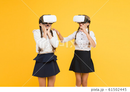 VR headset. Future education. Children schoolgirls 61502445