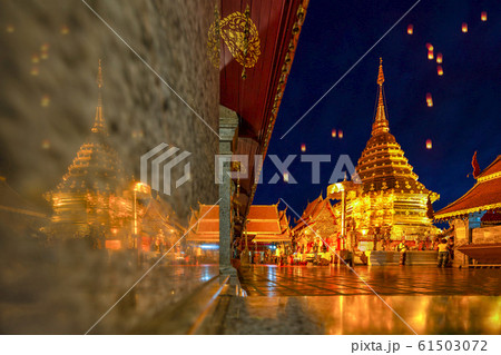 Beautiful Pagoda with reflection, Wat phra that doi suthep temple in Chiang mai thailand, the most famous temple at twilight, Yi Peng and Loy Krathong (Lantern Festival). 61503072