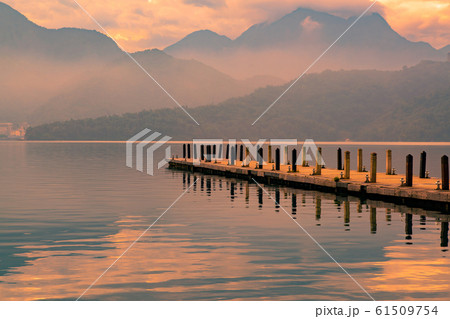 Wooden walking path thought reflection 61509754