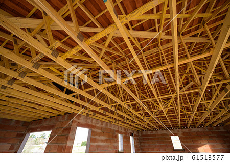 Residential construction home framing view on new house wooden under construction Residential construction home framing view on new house wooden under construction 61513577