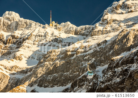 Gondola of the aerial tramway to the mountain Saentis in the Swiss Alps in winter, Switzerland 61513650