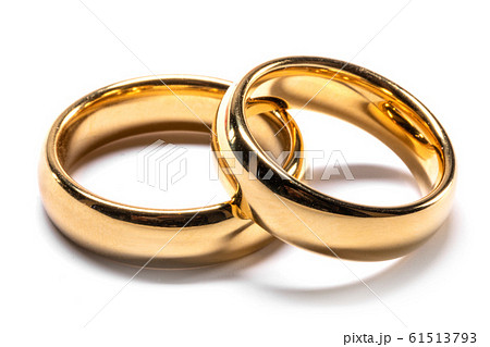 Gold wedding rings on white 61513793