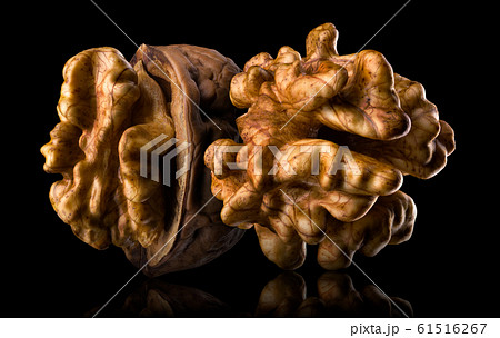 Set of walnuts isolated on a black background 61516267