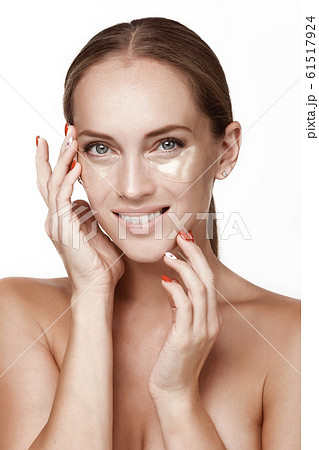 A beautiful young girl, after the shower, dresses A beautiful young girl, after the shower, dresses 61517924