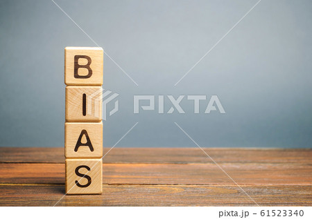 Wooden blocks with the word Bias. Prejudice. Personal opinions. Preconception Wooden blocks with the word Bias. Prejudice. Personal opinions. Preconception 61523340