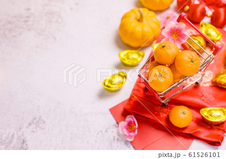 Chinese New Year, Shopping car with orange and Chinese New Year, Shopping car with orange and 61526101