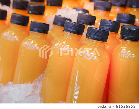Fresh carrot juice or orange juice, packed in a ready-to-drink Fresh carrot juice or orange juice, packed in a ready-to-drink 61526855
