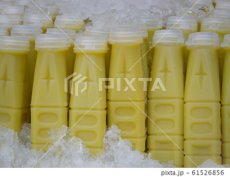 Fresh avocado juice, packed in a ready-to-drink frozen plastic bottle for sale. Fresh avocado juice, packed in a ready-to-drink frozen plastic bottle for sale. 61526856