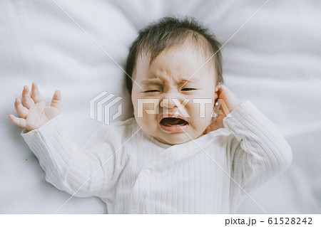 Baby boy crying newborn Baby boy crying newborn 61528242
