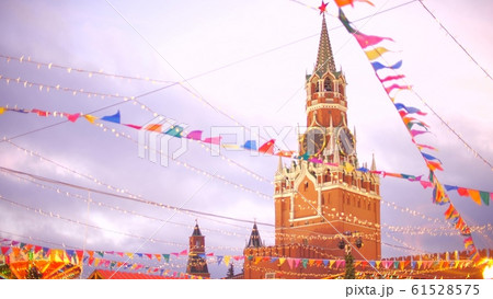 Famous Spasskaya Tower of the Moscow Kremlin behind New Year and Christmas decoration on the Red Square. Moscow, Russia 61528575