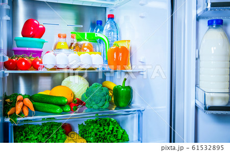Open fridge. Healthy food. Vegetables and fruits Open fridge. Healthy food. Vegetables and fruits 61532895