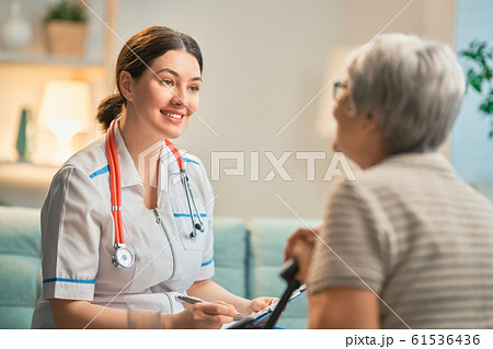 Happy patient and caregiver Happy patient and caregiver 61536436