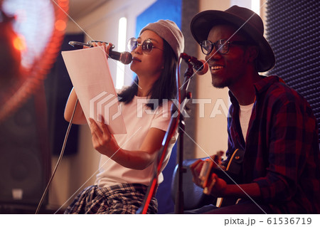Musical Duo Singing in Studio 61536719