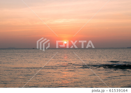 Sea pink sunset. Beautiful color clouds. Sea pink sunset. Beautiful color clouds. 61539164