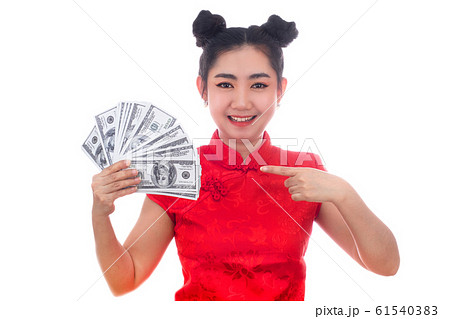 Portrait Asian woman red dress traditional cheongsam holding Money 100 Us dollar bills, China Girl, Concept Chinese New Year Portrait Asian woman red dress traditional cheongsam holding Money 100 Us dollar bills, China Girl, Concept Chinese New Year 61540383