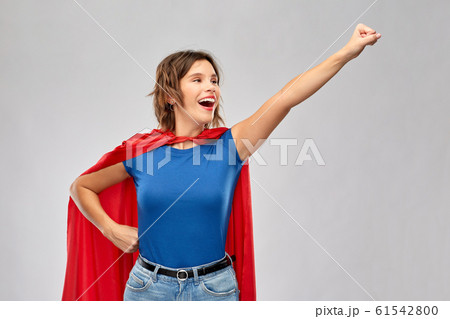 happy woman in red superhero cape happy woman in red superhero cape 61542800