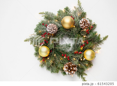 christmas fir wreath with balls, cones and lights christmas fir wreath with balls, cones and lights 61543205