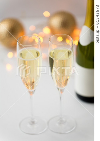 two glasses of champagne on christmas 61543673