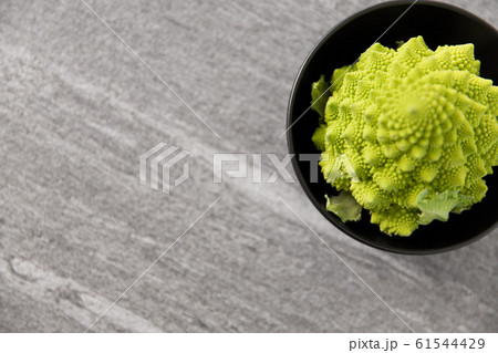 close up of romanesco broccoli in bowl 61544429