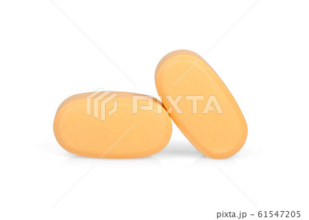brown pills isolated on white background 61547205