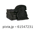 charcoal bread isolated on white background 61547231