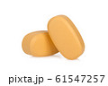 brown pills isolated on white background 61547257