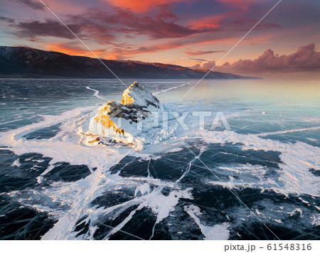 Elenka Island on Lake Baikal in winter. Aerial view. Elenka Island on Lake Baikal in winter. Aerial view. 61548316