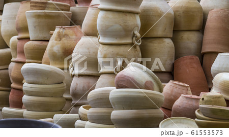 freshly made pots clay jugs for flowers 61553573