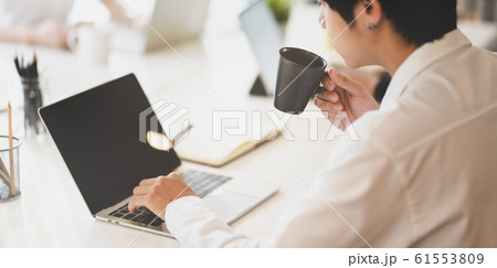 Professional businessman working on his laptop 61553809