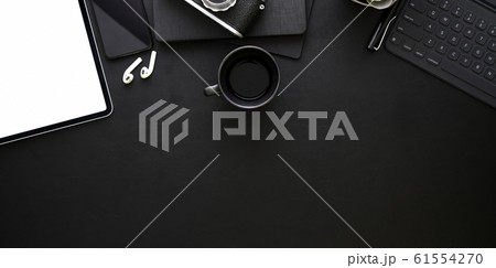 Top view of dark stylish workplace with office 61554270