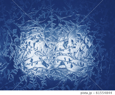 ice background texture frost pattern. Classic blue toning trend 2020 year color 61554844