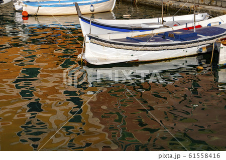 Camogli houses reflection in the harbor water sea 61558416
