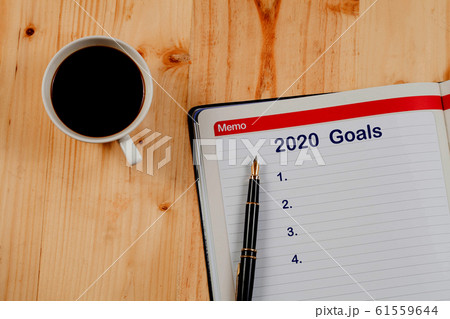 2020 goals plan list on book note ,Business plan. 61559644