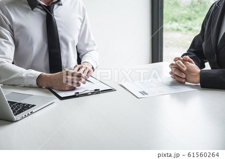 Employer arriving for a job interview, committee Employer arriving for a job interview, committee 61560264