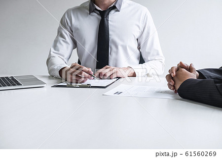 Employer arriving for a job interview, committee 61560269