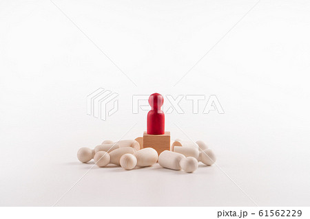 Wooden figure standing on the box for show Wooden figure standing on the box for show 61562229