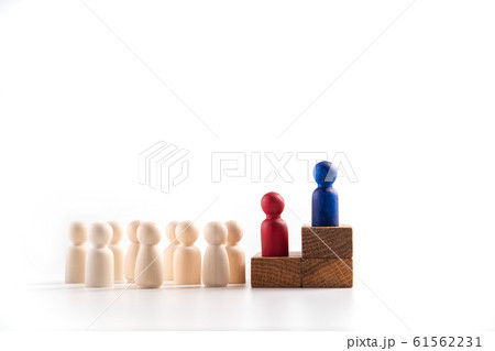 Wooden figure standing on the box for show Wooden figure standing on the box for show 61562231