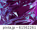 Abstract crumpled foil background. Grunge photo 61562261