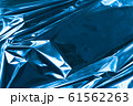 Abstract crumpled foil background. Grunge photo 61562263
