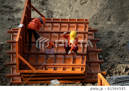 A construction worker in workplace. 61564585